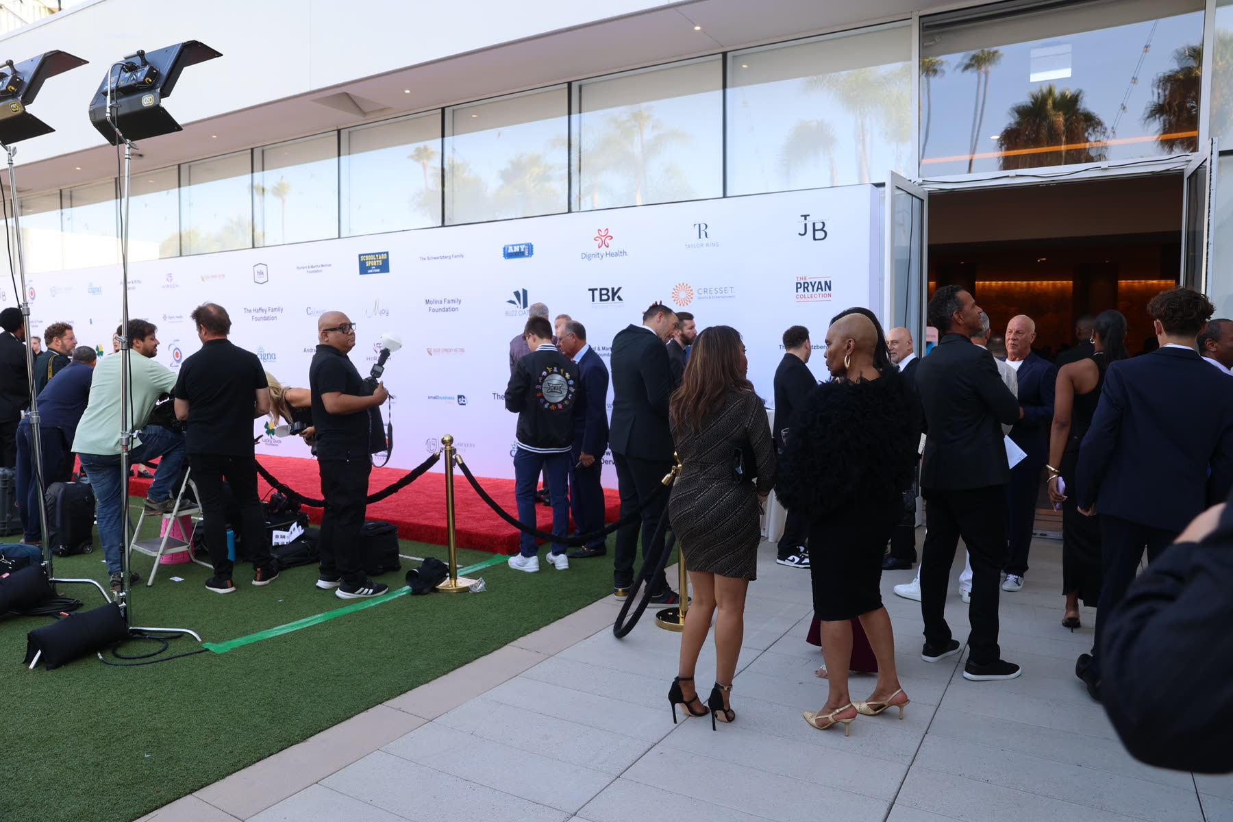 Charity gala ballroom set for a celebrity dinner