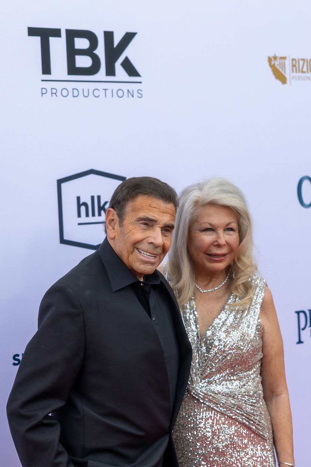 Supporters on the red carpet before the program